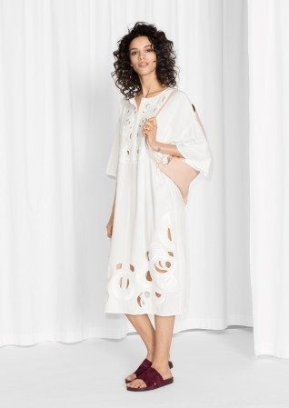 &Other Stories cut-out dress, [$145](http://www.stories.com/us/Ready-to-wear/Dresses/Cut-Out_Embroidery_Dress/582938-102619969.1).