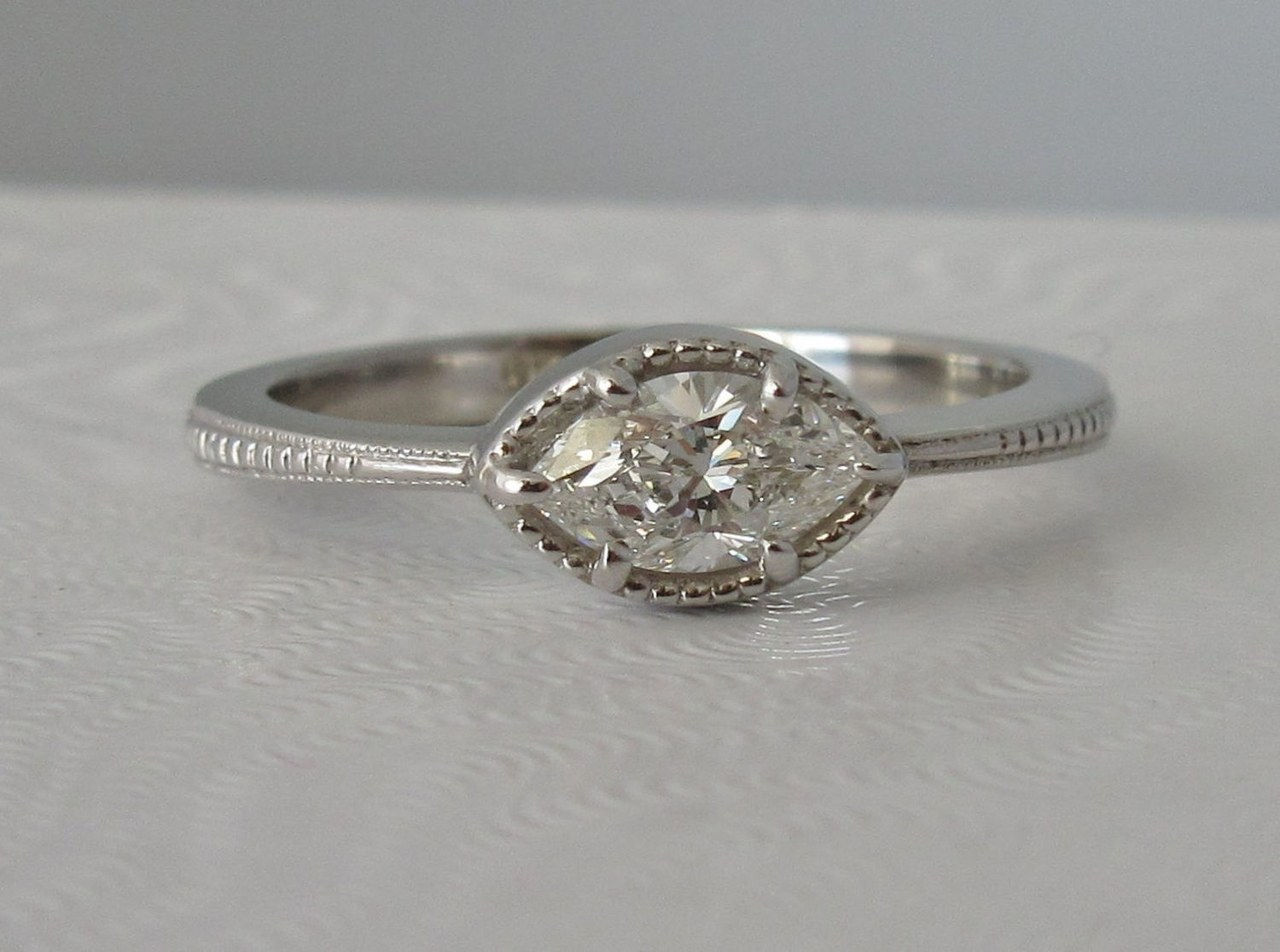 12 east west engagement rings 0306 courtesy