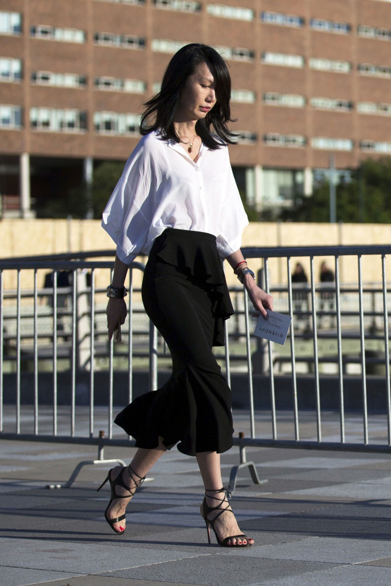 white shirt outfit ideas date black ruffle skirt melodie jeng