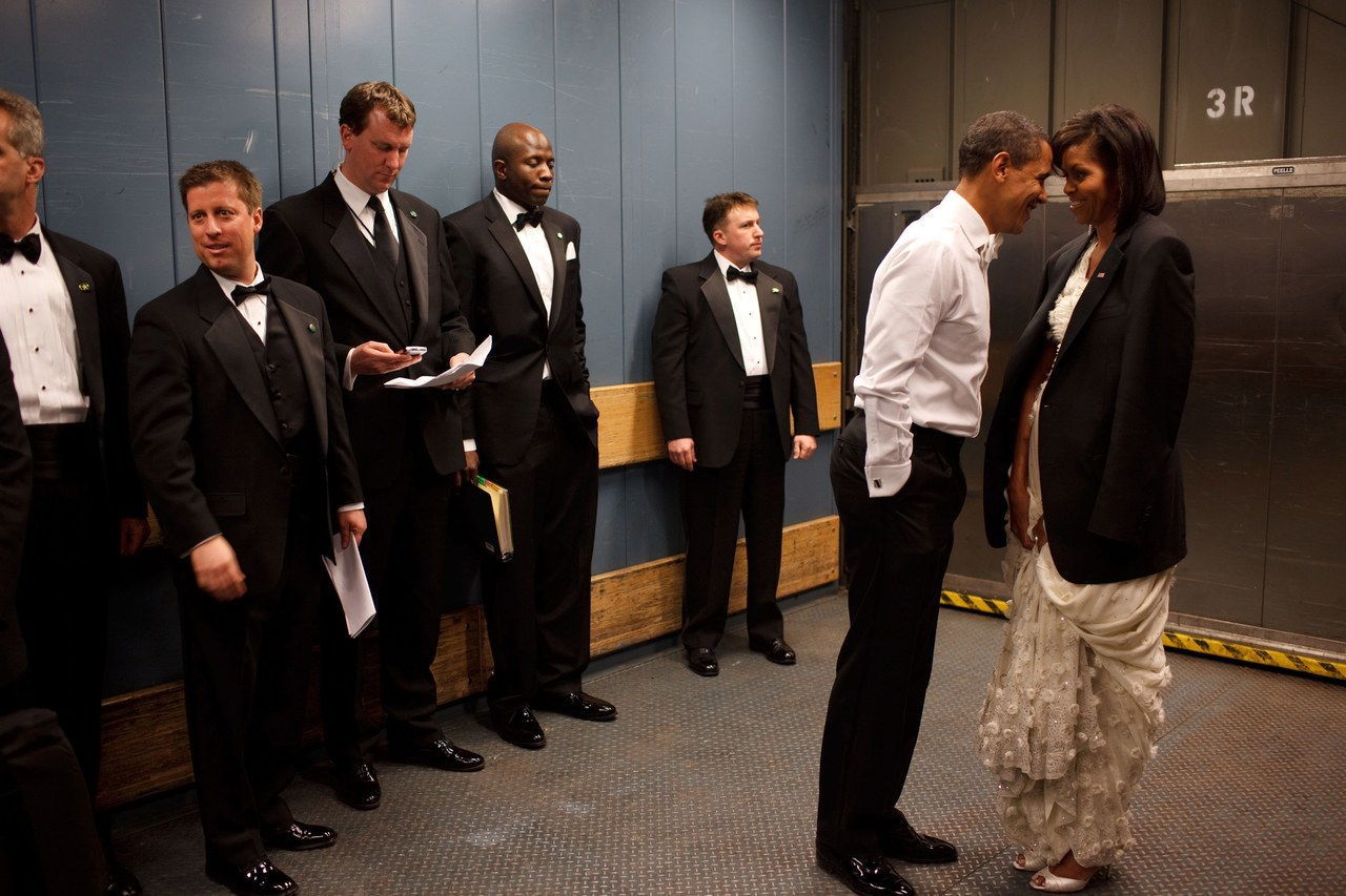 باراك and Michelle share a moment together in a freight elevator after an Inaugural Ball on January 20, 2009.