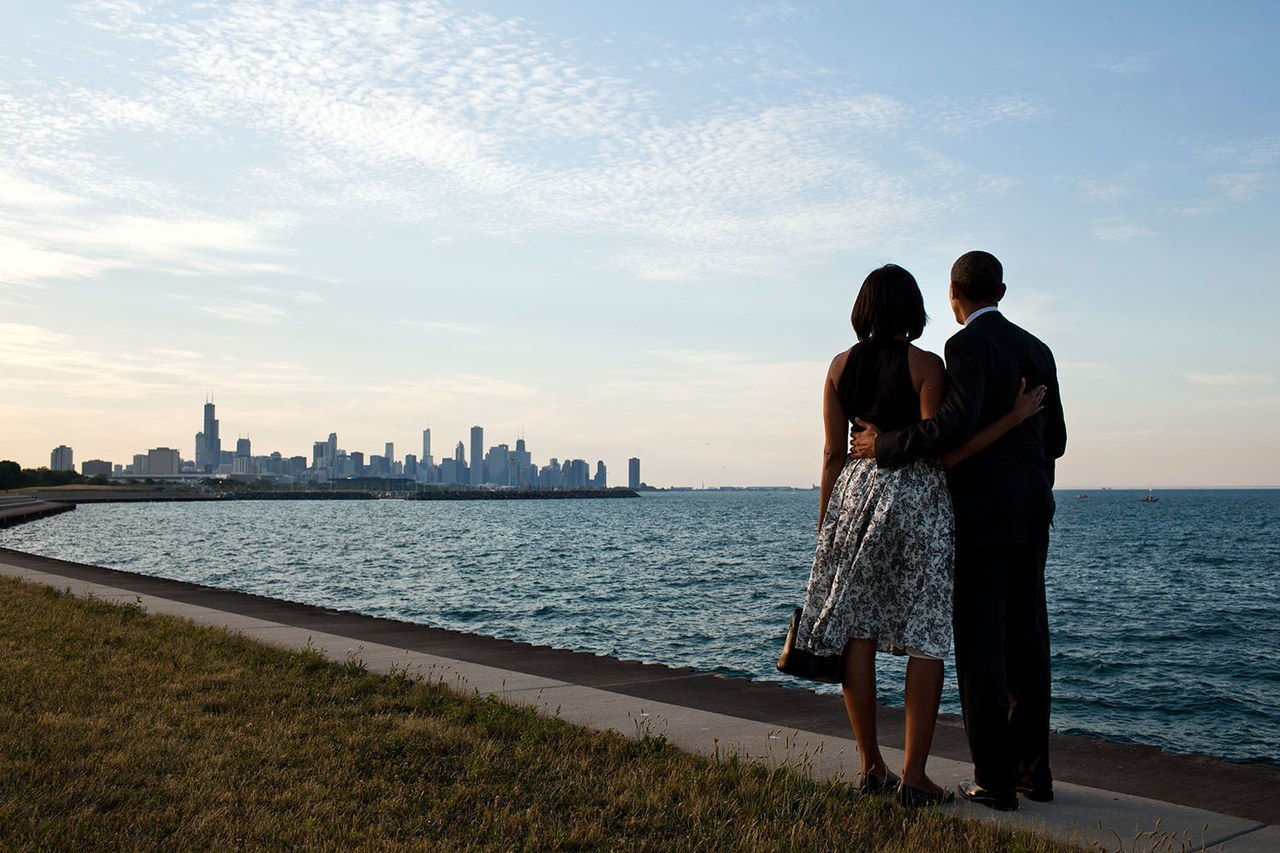 后 landing in a helicopter in Chicago, Barack and Michelle walked past their motorcade to the edge of Lake Michigan to view the skyline of their hometown on June 15, 2012.