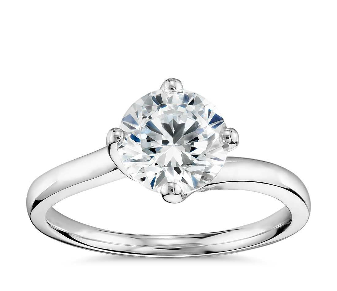 [حقا Zac Posen East-West Solitaire Engagement Ring](http://www.bluenile.com/build-your-own-ring/truly-zac-posen-east-west-solitaire-engagement-ring-platinum_55994){: rel=nofollow}, $650 (setting only).