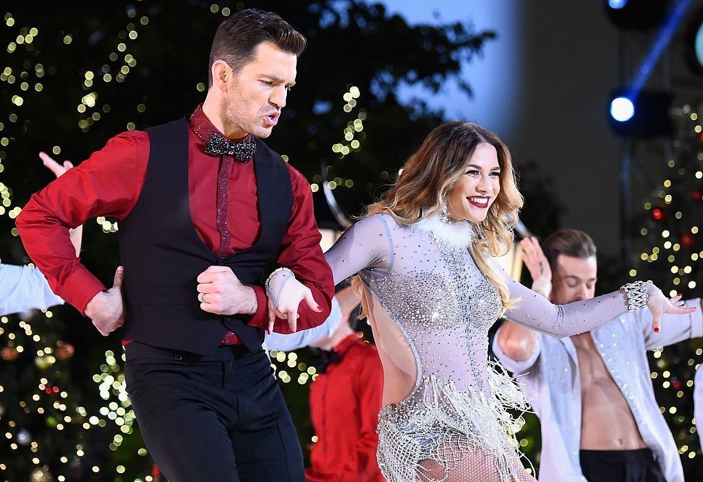 Holker performing with singer Andy Grammer during the *Dancing With The Stars* finale in 2015.