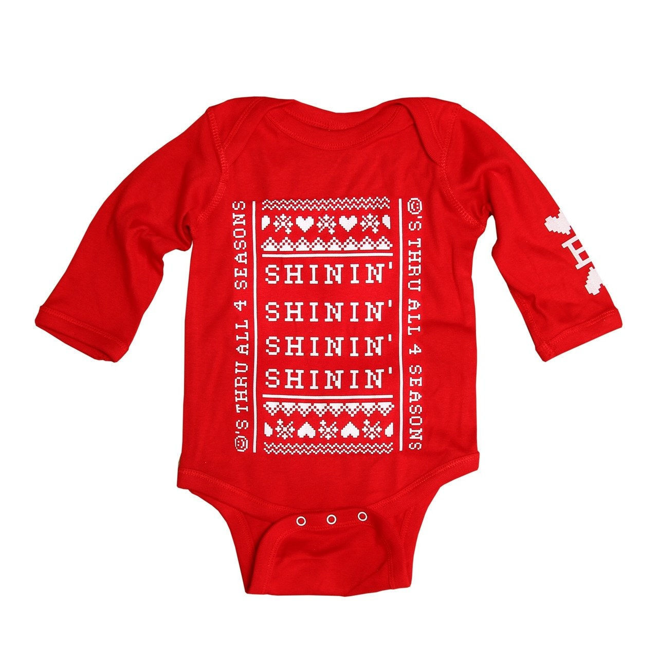 Shinin' Ugly Sweater Infant Onesie, $30, [Beyonce.com](https://shop.beyonce.com/products/62193-shinin-ugly-sweater-infant-onesie) 