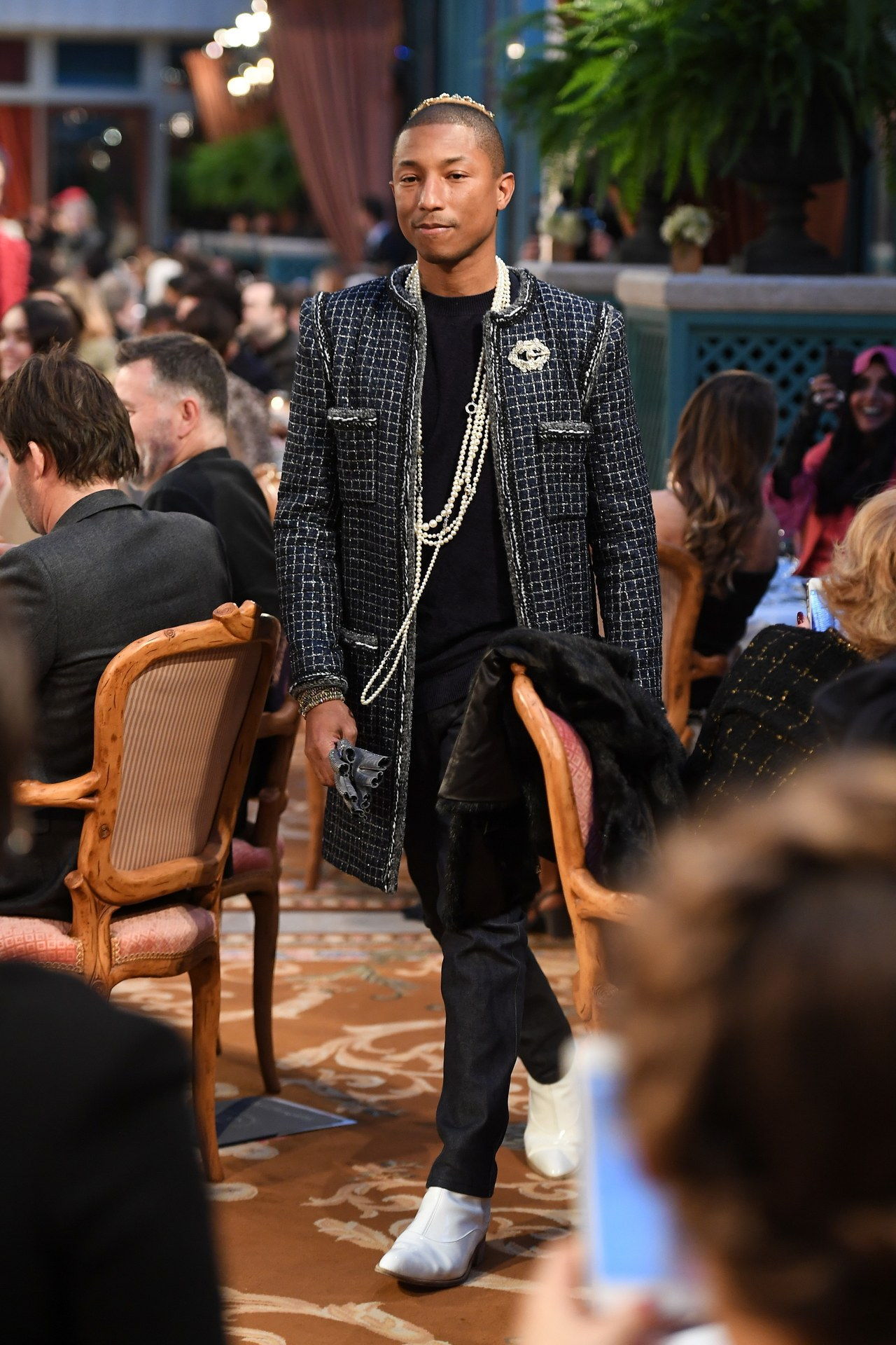 PARIS, FRANCE - DECEMBER 06: Pharrell Williams walks the runway during 