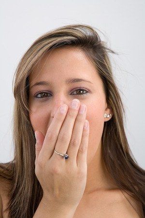 0129 woman covering mouth sm
