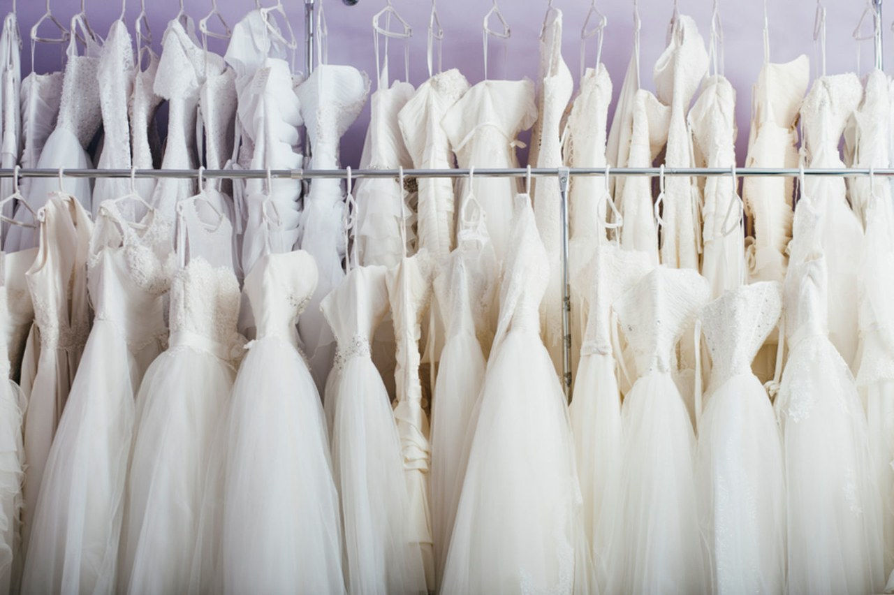 fila of wedding dresses