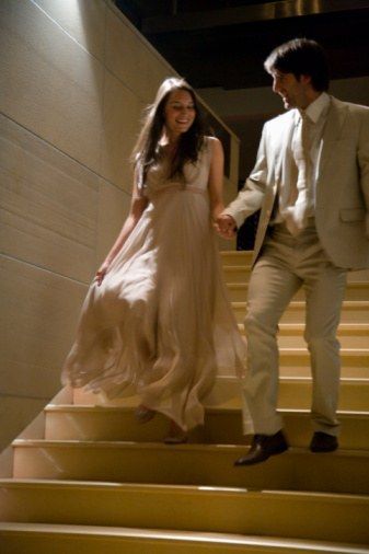 0723 bride and groom walking down stairs at night we