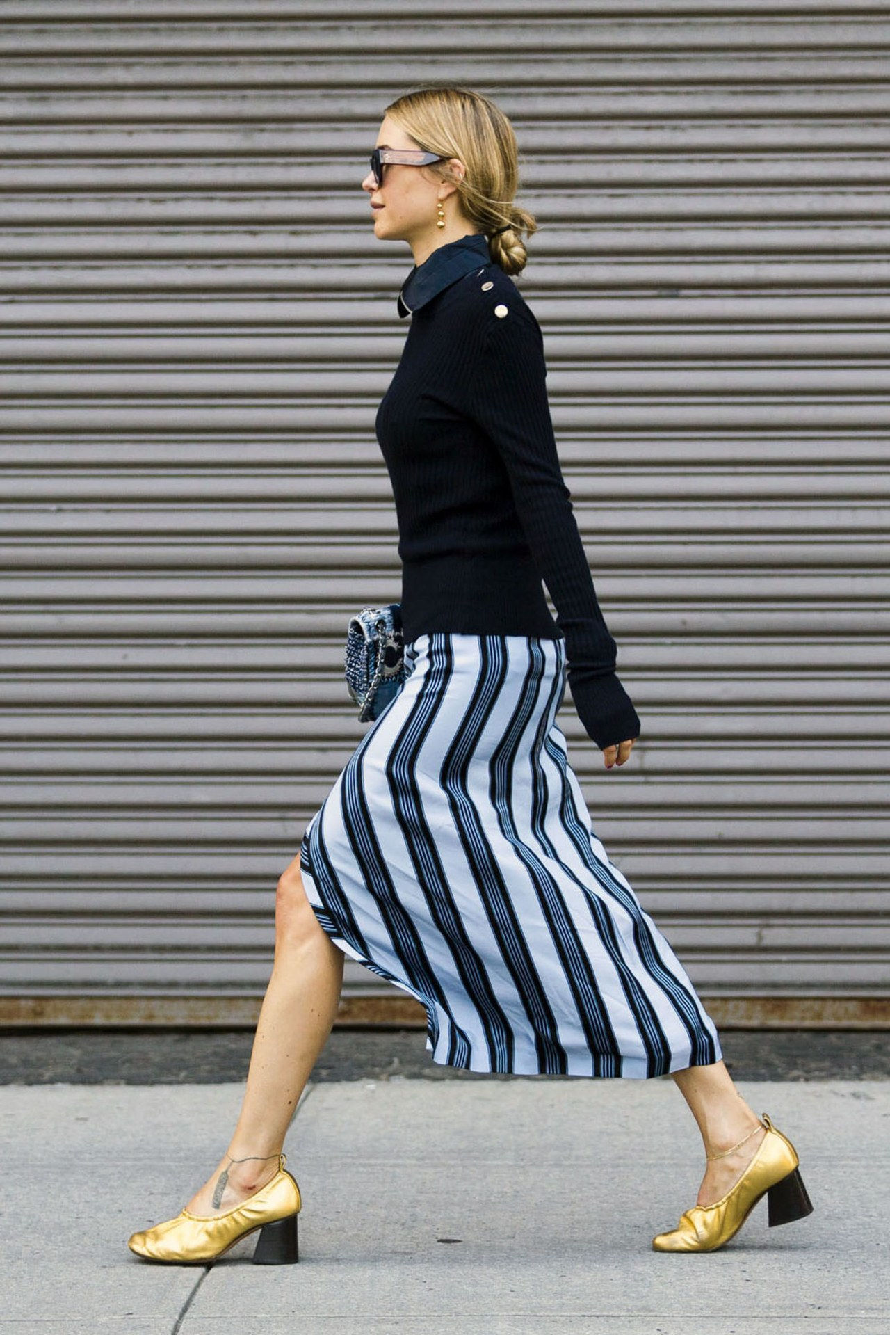 first day of fall outfit idea striped midi skirt sweater